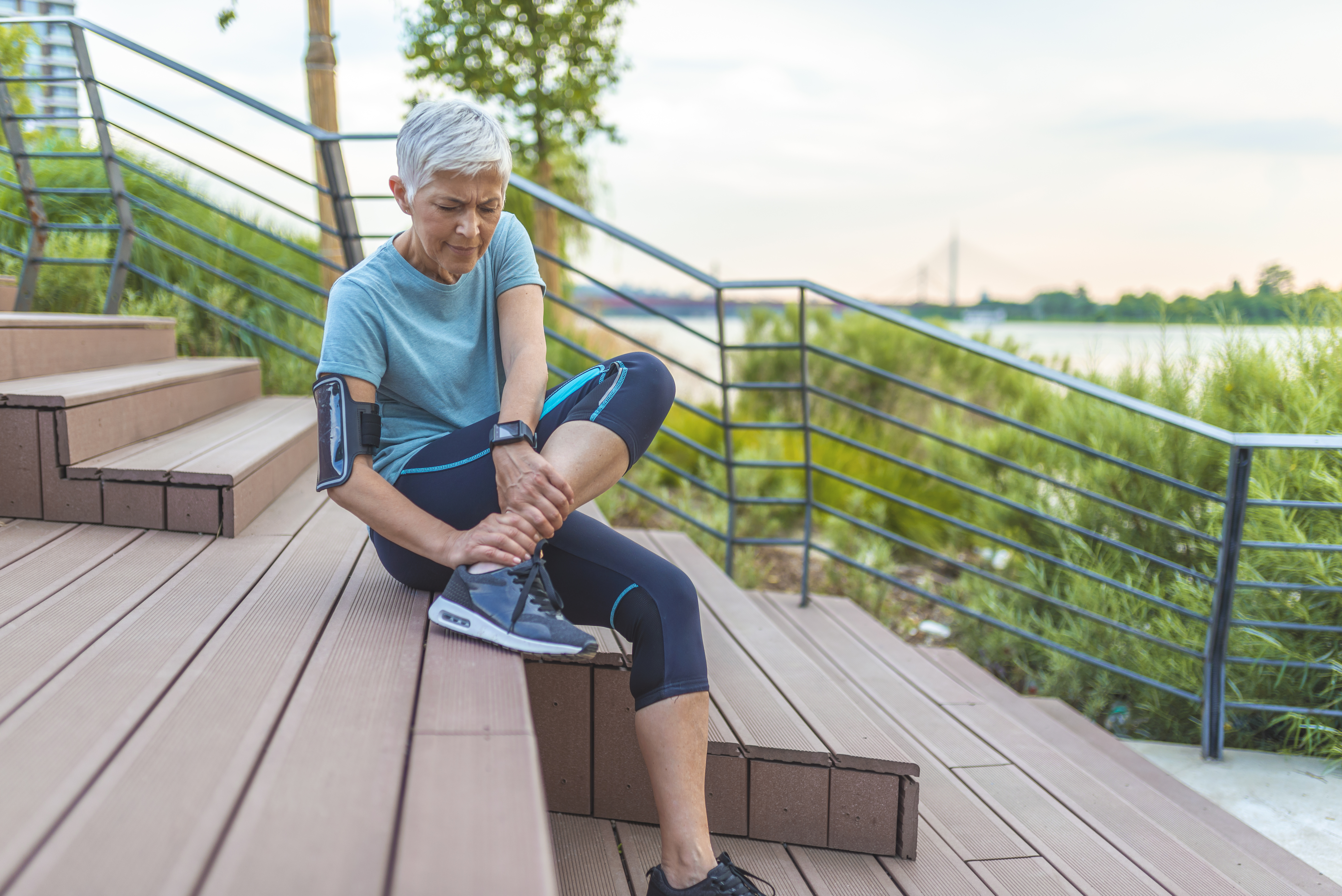 Elderly woman doing stretching exercises